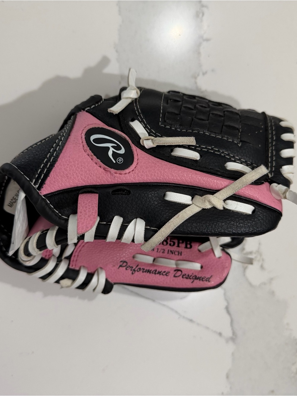 Girl Rawlings pink and black baseball glove